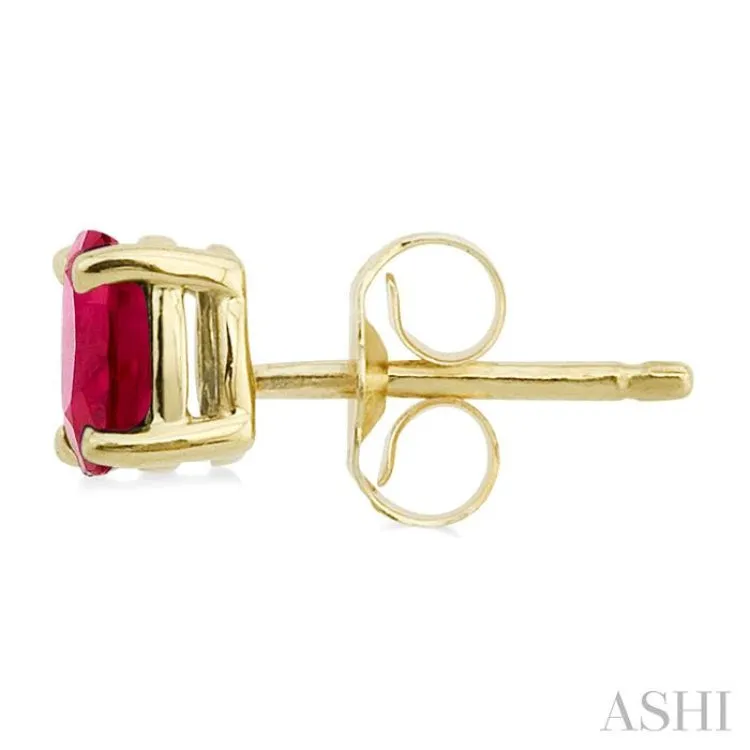 5x3MM Oval Cut Ruby Stud Earrings in 14K Yellow Gold