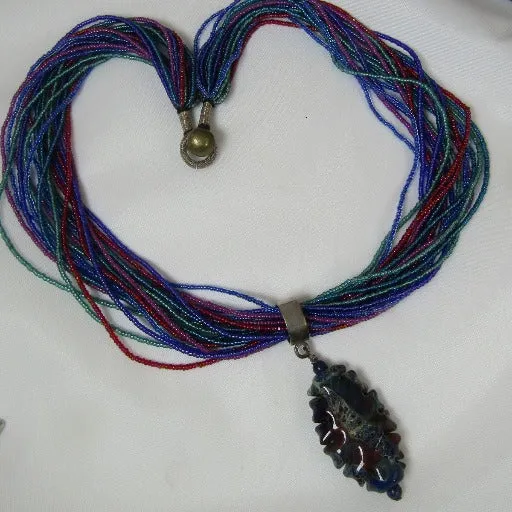 Multi-colored Seed Bead Necklace with Blue Artisan Pendant