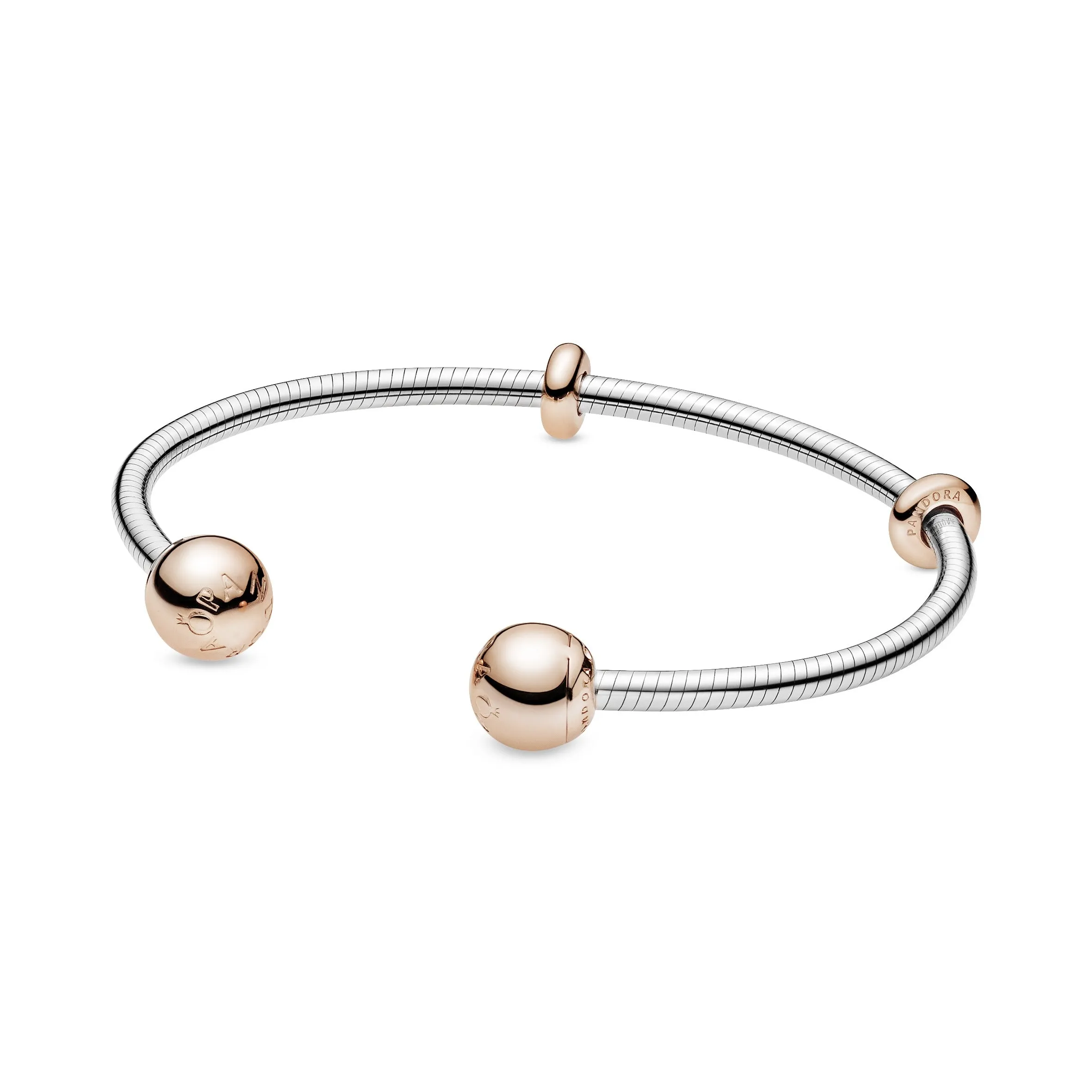 Sterling silver open bangle with 14k Rose Gold-plated silicone stoppers and interchangeable end caps