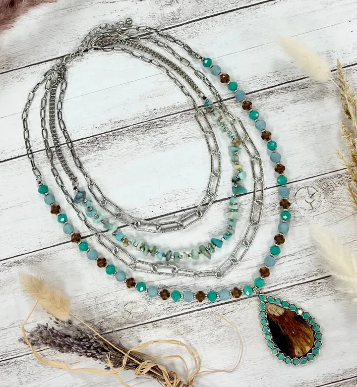 Turquoise Layered Necklace with cow hide pendant