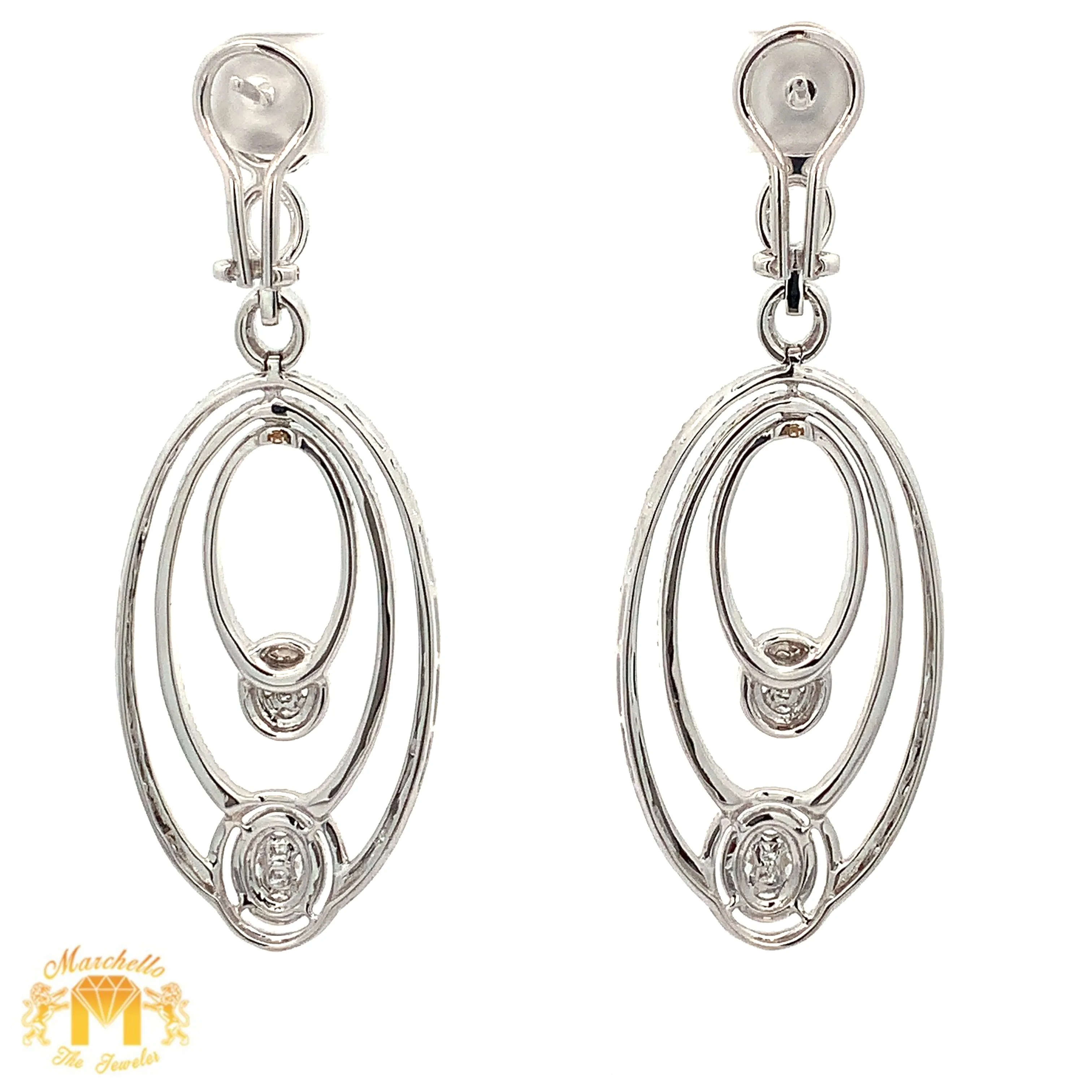 VVS/vs high clarity diamonds set in a 18k White Gold Dangling Oval Shape Diamond Earrings