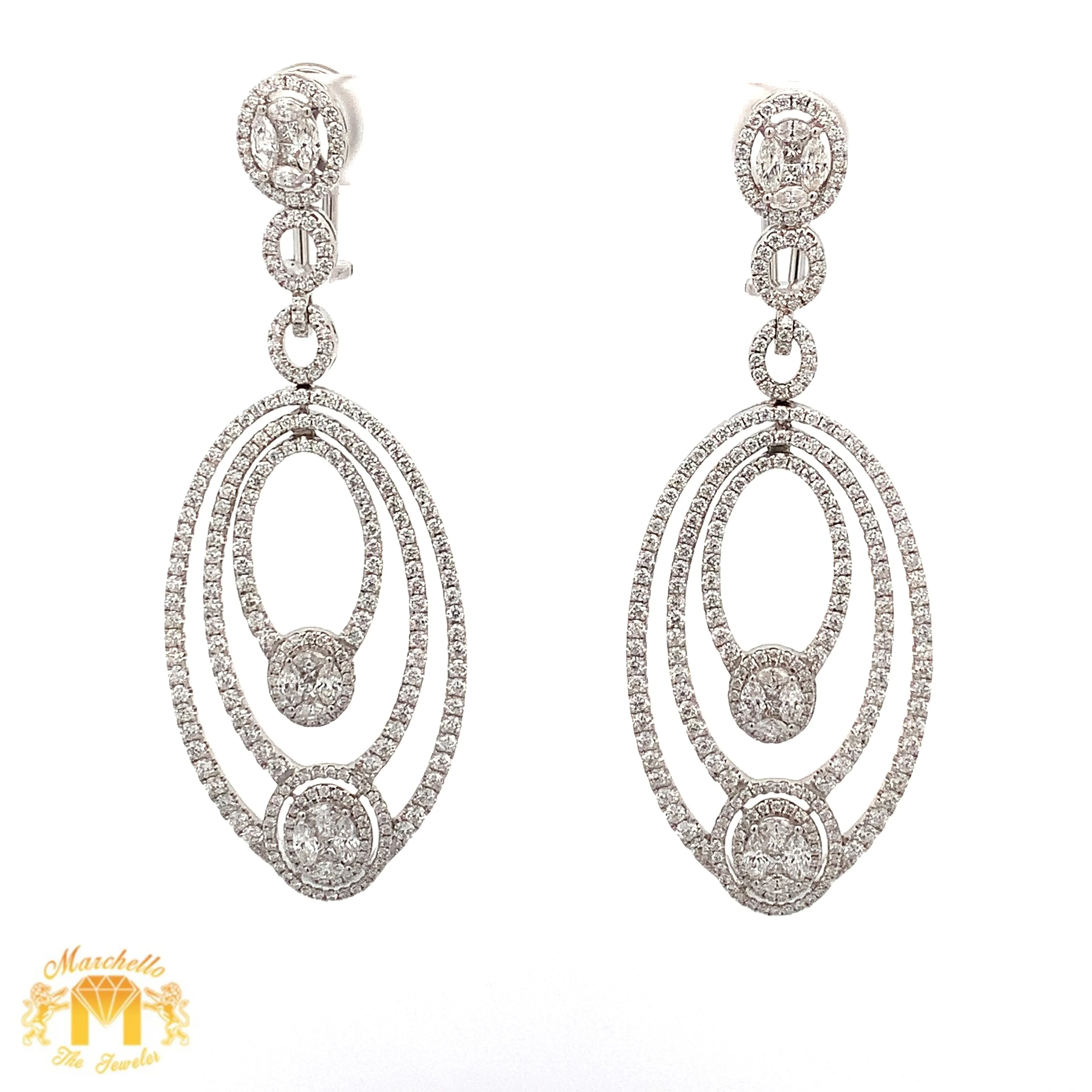 VVS/vs high clarity diamonds set in a 18k White Gold Dangling Oval Shape Diamond Earrings